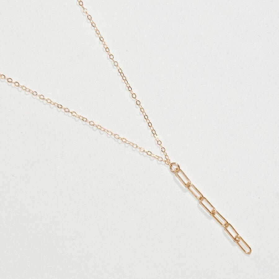 Clip Chain Lariat Necklace from Kolohe's Upcycled Collection. These jewelry pieces are sourced from extra raw material so every piece is sustainable in design. 14K Gold Fill and Sterling Silver Jewelry that is tarnish and water resistant.