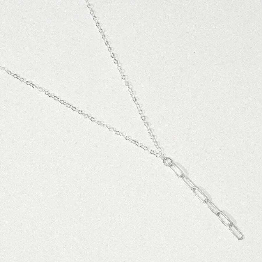 Clip Chain Lariat Necklace from Kolohe's Upcycled Collection. These jewelry pieces are sourced from extra raw material so every piece is sustainable in design. 14K Gold Fill and Sterling Silver Jewelry that is tarnish and water resistant.