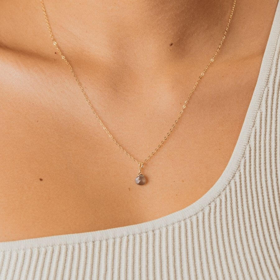 Mini Labradorite Necklace from Kolohe's Upcycled Collection. These jewelry pieces are sourced from extra raw material so every piece is sustainable in design. 14K Gold Fill and Sterling Silver Jewelry that is tarnish and water resistant.